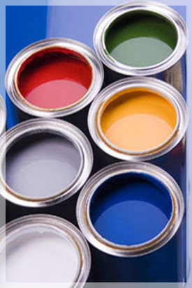 open cans of colorful paint