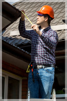 man inspecting his roof 